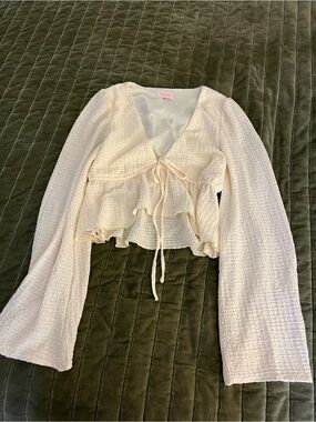 Pink Lily Cream Textured Tie-Front Ruffle Blouse